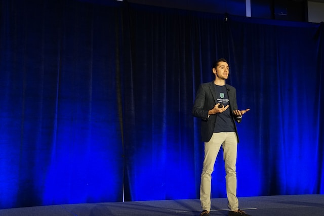 Man giving a presentation on Stage