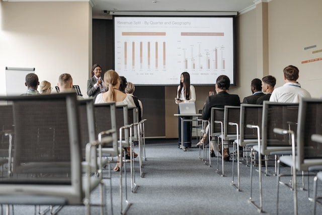 A girl student presenting in front of class