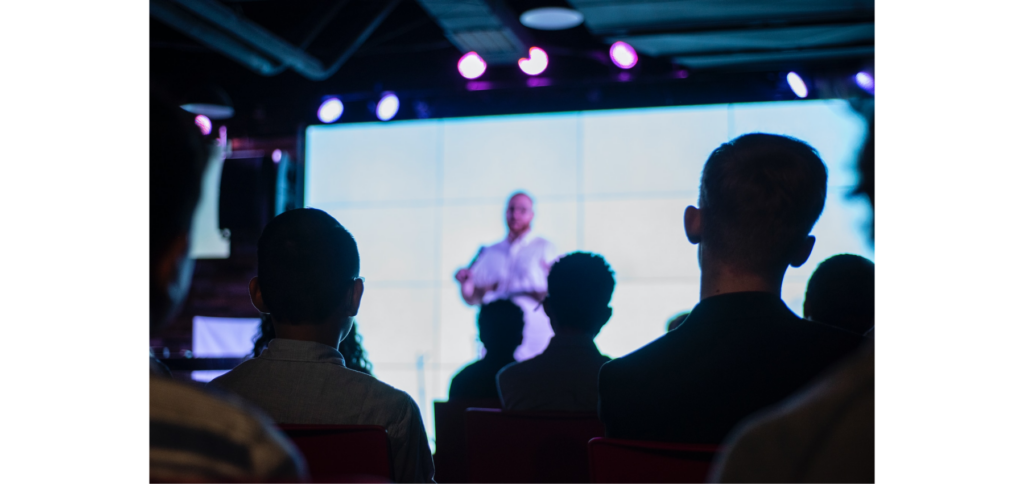 Man giving a presentation to an audience