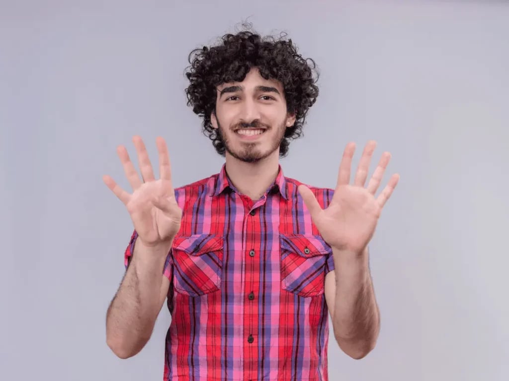 a boy showing hands